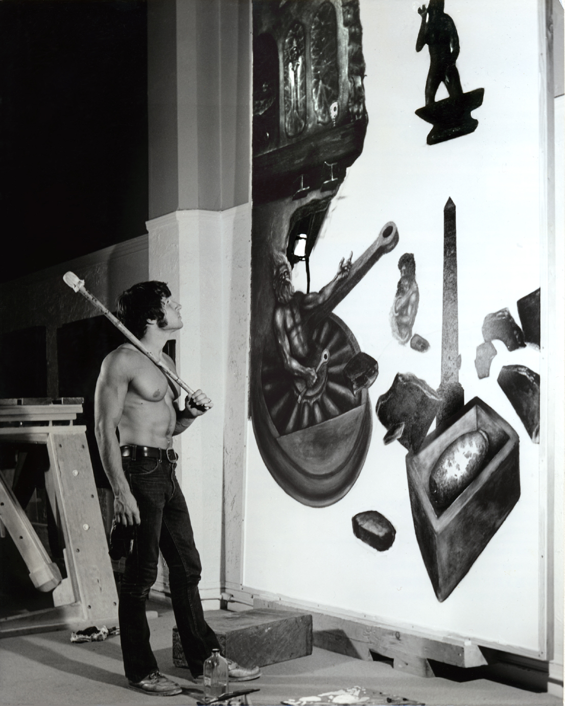 Mark Mulleian studying his mural-size painting.